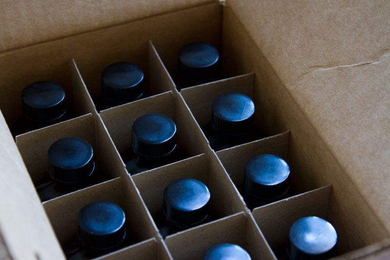 box of bottles reading my tea leaves