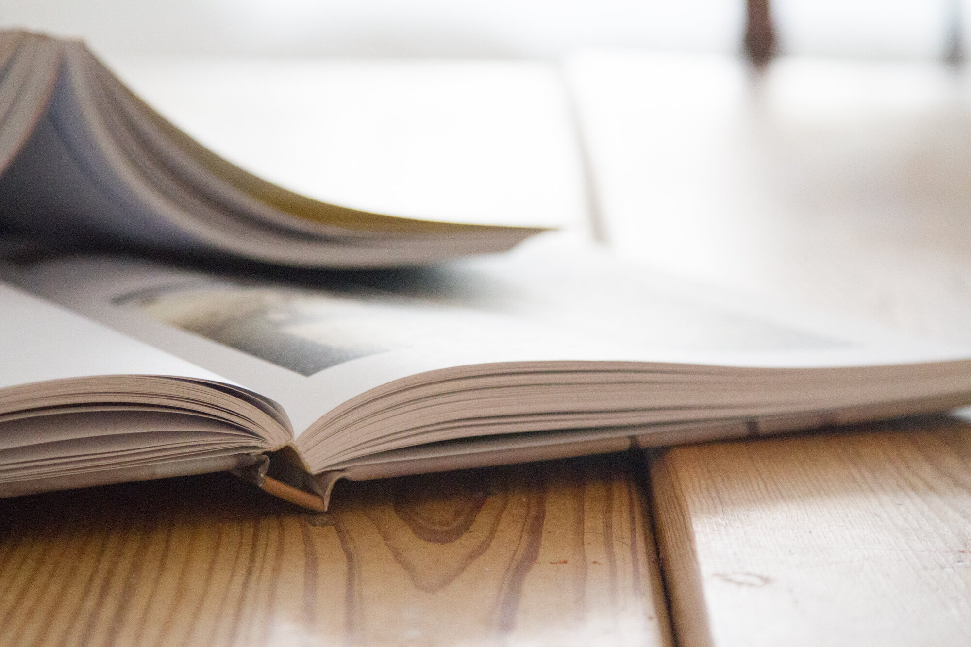 open books on a table | reading my tea leaves
