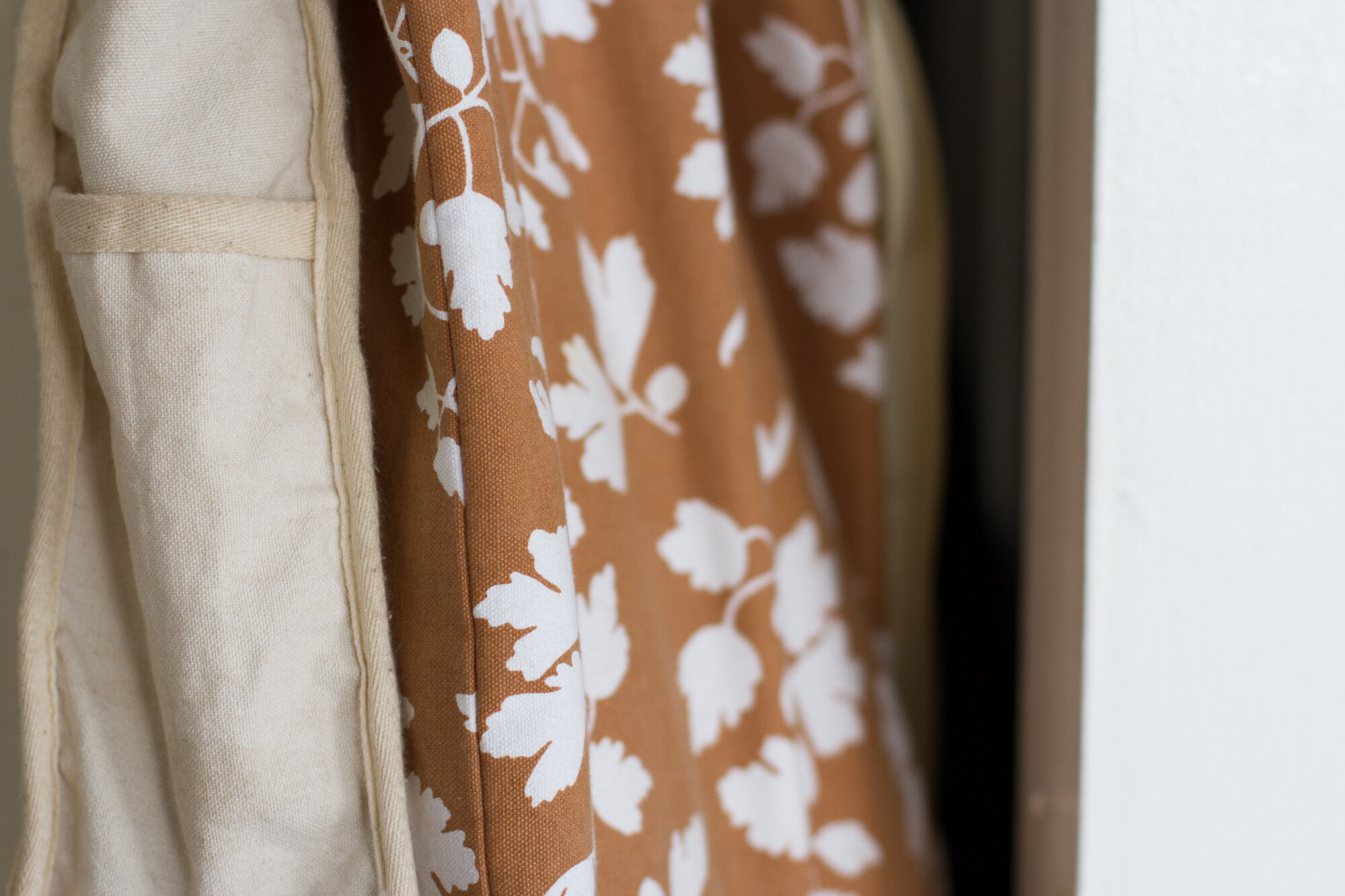 bags hanging in a closet