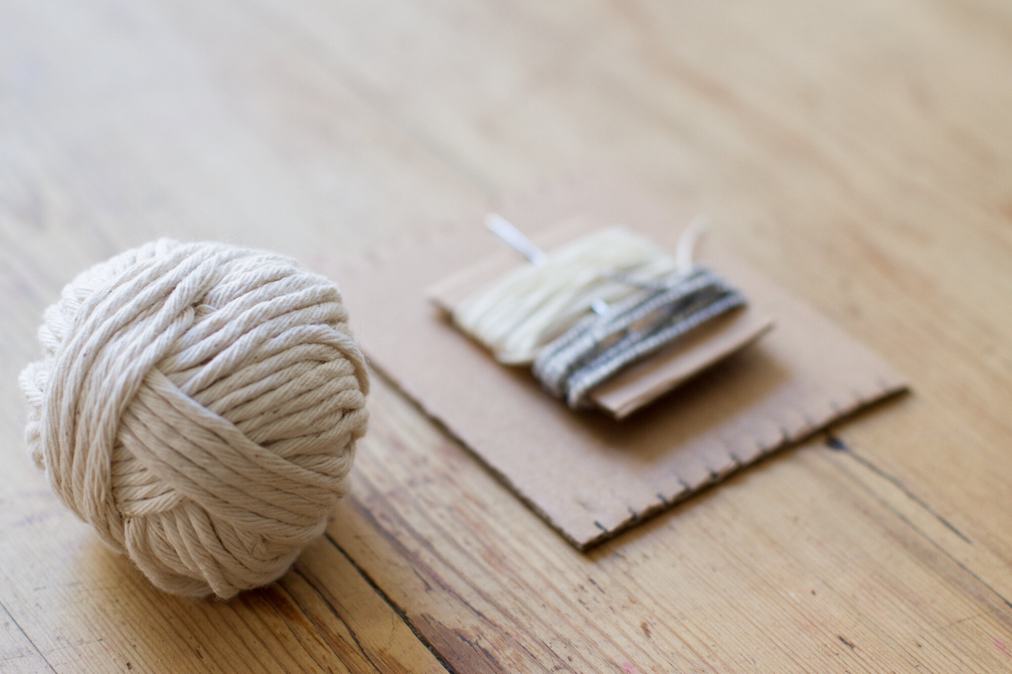 twine and string on a wooden table
